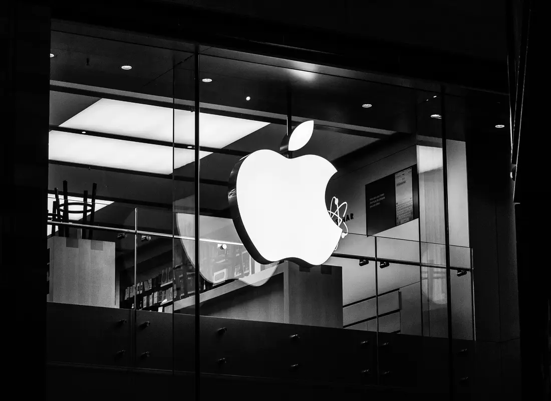 Monochrome photograph of the first floor of the Exeter Princesshay Apple Store in the early morning